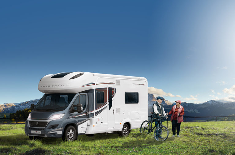 a couple near their secure motorhome