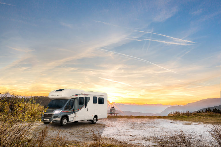 used motorhome in sunset scene