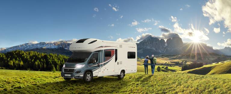 A couple enjoying their motorhome holiday in Europe